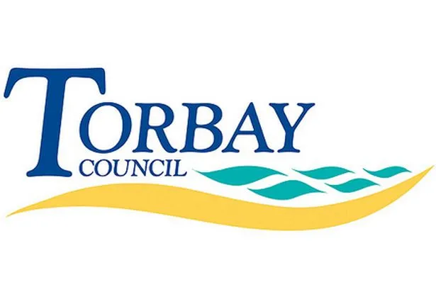 Logo of Torbay Council with blue text and wave design elements in blue and yellow.